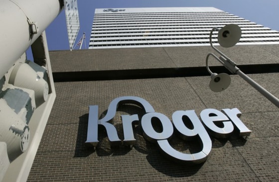 ** FILE ** In this Sept. 18, 2007 file photo, Kroger Co., whose headquarters building in Cincinnati, is shown.Kroger Co. reported Tuesday, March 10, 2009, that its fourth-quarter profit rose 8 percent, as more price-conscious shoppers bypassed restaurants and loaded their carts with store brands at record rates. Its shares jumped 8 percent. (AP Photo/Al Behrman, file)